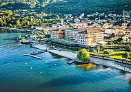 Grand Hotel Dino, Grand Hotel Dino am Lago Maggiore im Frühling 2026., Grand Hotel Dino am Lago Maggiore in sonniger Frühlingslandschaft.
