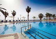 Hotel Peñíscola Palace Pool mit Palmen und Meerblick