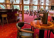 Lounge auf MS Olympia, Gemütliche Lounge auf der MS Olympia mit eleganter Einrichtung., Gemütliche Lounge auf der MS Olympia mit eleganter Einrichtung.