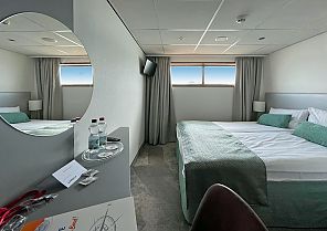 MS Rio Hauptdeckkabine, Moderne Hauptdeckkabine auf dem Kreuzfahrtschiff MS Rio., MS Rio Hauptdeckkabine mit modernem, gemütlichem Design.