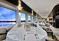 MS Rousse Prestige Restaurant, Elegantes Restaurant auf der MS Rousse Prestige mit Seeblick.