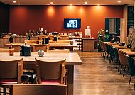 Restaurant im Pentahotel Leipzig, Modernes Restaurant im Pentahotel Leipzig mit gemütlichem Ambiente., Modernes, einladendes Restaurant im Pentahotel Leipzig.