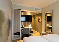 Zimmerbeispiel Einzelzimmer, Modernes Einzelzimmer im The Rilano Hotel München.