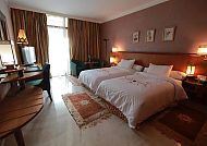 Hotel Transatlantique, Beispielzimmer, Gemütliches Hotelzimmer im 4*-Hotels Marokko, stilvoll eingerichtet., Gemütliches Zimmer im 4*-Hotel Transatlantique, Marokko.