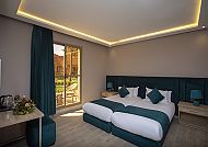 Hotel Karam Palace, Beispielzimmer, Modernes Hotelzimmer im Karam Palace, stilvoll und komfortabel.